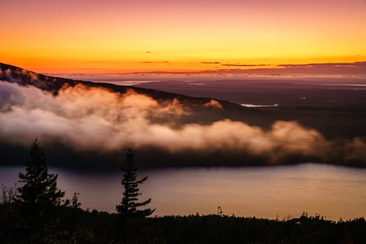 Scenic sunset in Acadia National Park as seen from the top of Cadillac Mountain
