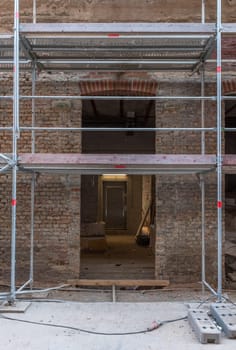 Scaffolding on the facade of a former factory