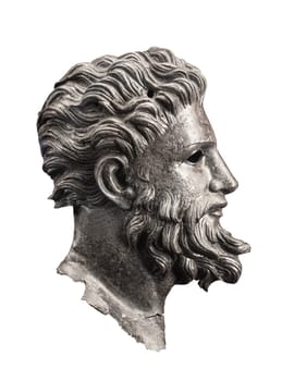 front view closeup of ancient dark metallic basorelief of handsome man with beard looking forward isolated on white background