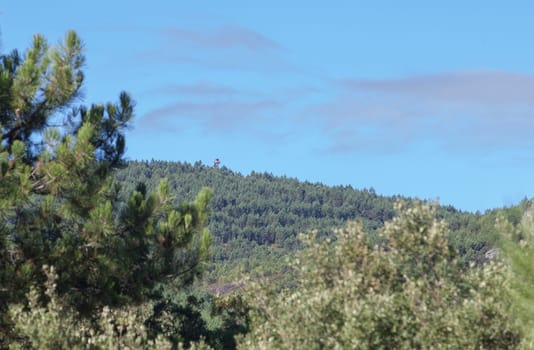 Fire lookout tower in forest of Sierra Fria. Valencia de Alcantara, Caceres, Extremadura, Spain
