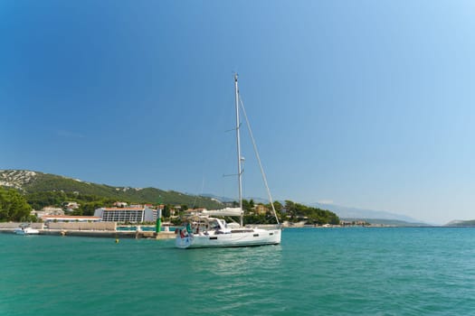 Sailing yacht in the harbor of the town of Rab on the island of the same name on the Adriatic Sea in Croatia