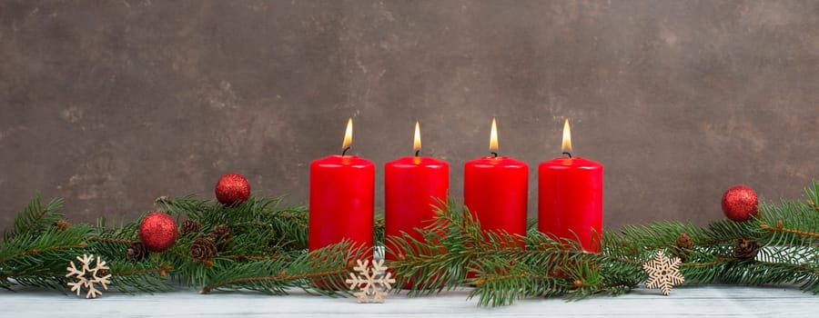 Red candles on a advent wreath, christmas decoration with candlelight