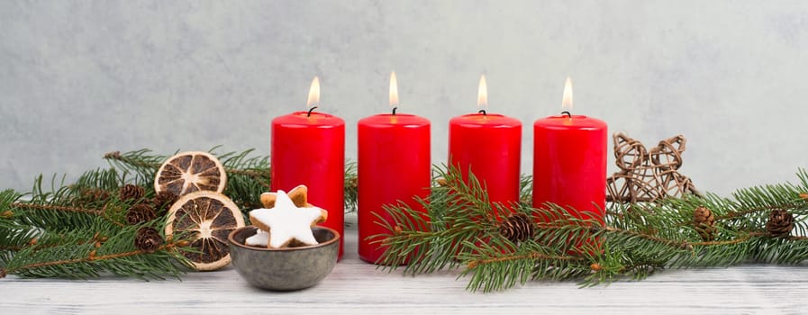 Red candles on a advent wreath, christmas decoration with candlelight