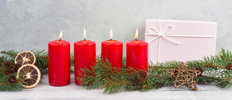 Red candles on a advent wreath, christmas decoration with candlelight