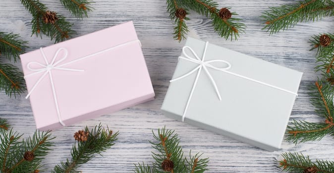 A gift parcel with christmas decoration, branch of fir, presents for the holiday, empty copy space