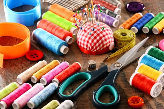 Composition with tailor accessories on wooden table