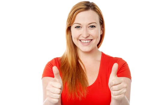 Pretty woman showing double thumbs up