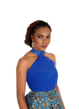 A profile portrait of a beautiful African American woman with braided hair.standing in a blue blouse isolated for white background..