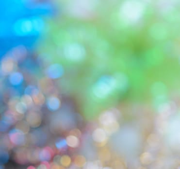 Abstract colorful bokeh background of defocused twinkling lights