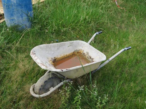 beautiful old wheelbarrow worked old rusty transport