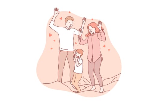Parenthood, playing, love concept. Parenthood is great responsibility. Young man and woman, father and mother play with their child, jumping on bed. Husband and wife, boy and girl love their son.