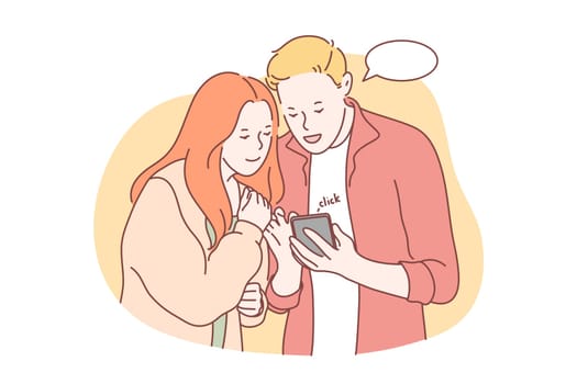 Communication, social media or network concept. Young couple in love communicates in social network. Man and woman watch videos in social media. Boyfriend and girlfriend type messages in smartphone.