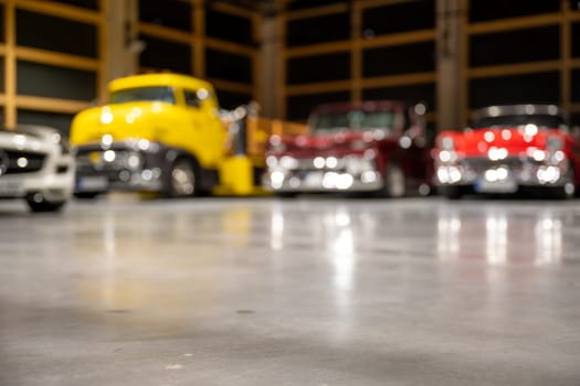 expensive old cars in a garage
