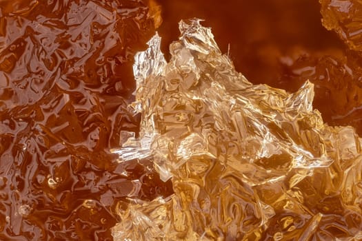 Crystalized honey African lychee , white crystals forming regular shapes. Microscope photo, image width 9mm.
