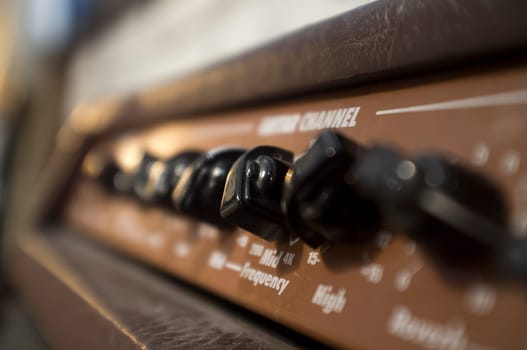 Fine-tune controls of retro style amplifier device. Selective focus