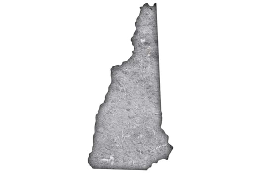 Map of New Hampshire on weathered concrete