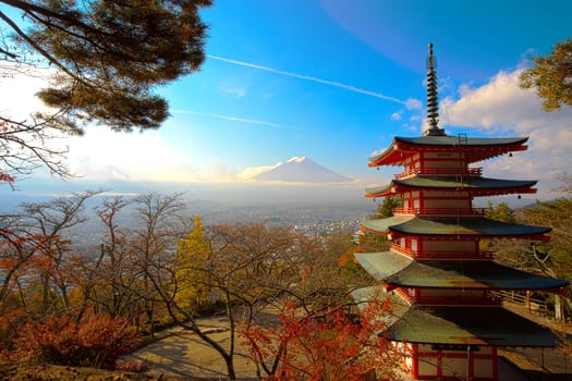 The beautiful Autumn scenery of Red pagoda Chureito the famous tourist attraction in fujinomiya town and Mount Fuji at sunset in Yamanashi prefecture, Japan