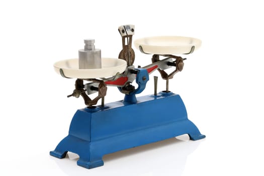 Retro roberval balance with weight, scale isolated on a white background