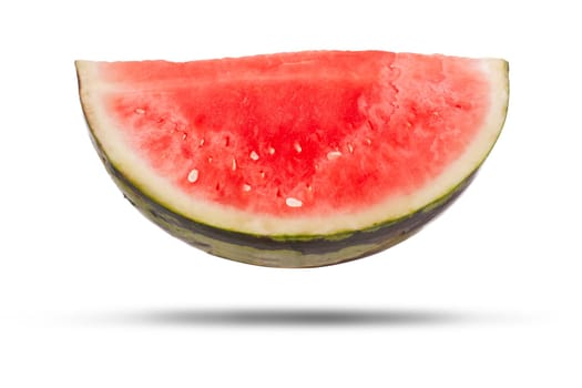 Watermelon slice isolated on a white background. Large fresh fruit cut open with red flesh inside