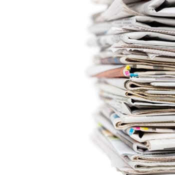 Pile of stacked generic folded newspapers background on white background with copy space. News and updates concept.