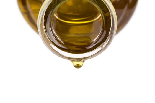Oil drop on a bottle. Oil pouring from a bottle