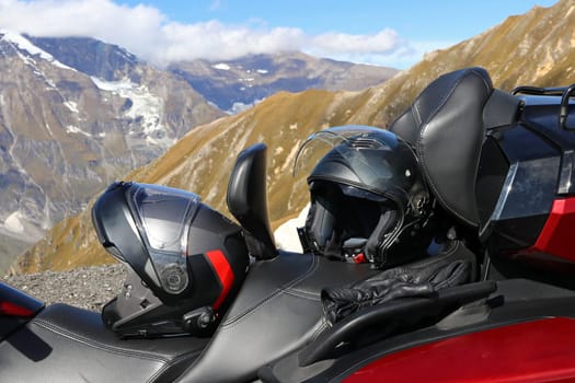 Protective clothing when riding a motorcycle. Motorcycle helmet and gloves is an important protection when riding a motorcycle in the mountains