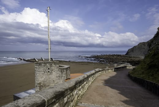 Detail of pedestrian access to a beach in summer