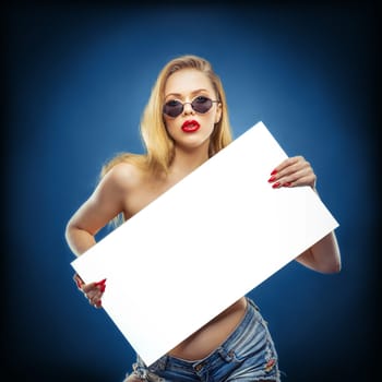 young beauty with a white board in her hands