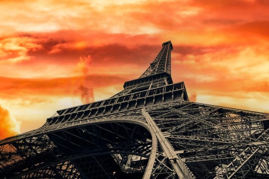 View of Eiffel Tower on sunset sky background