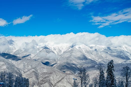 mountains with white snow and blue sky