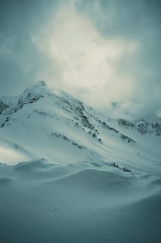 mountains with white snow and blue sky