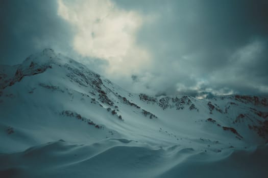 mountains with white snow and blue sky
