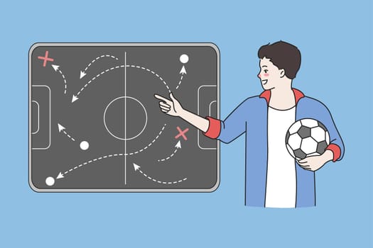 Football coach give instruction on board for players
