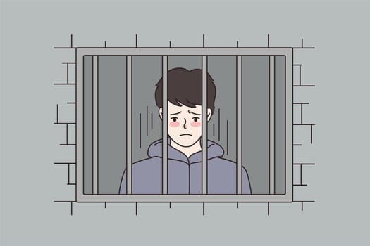 Sad man behind steel bars in country jail. Distressed unhappy male feel depressed sit in prison. Criminal convict imprisoned for illegal actions. Cartoon character flat vector illustration.