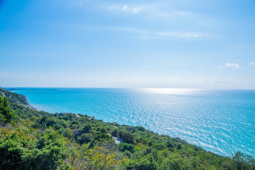 Blue sea against the sky, view from the cliff. . High quality photo