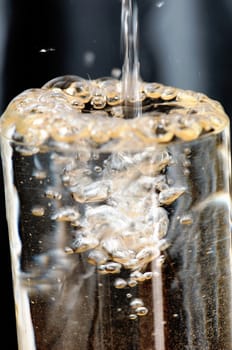 glass with water on a gray background