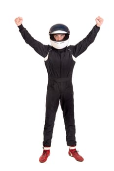 Victorious racing driver posing with helmet isolated in white