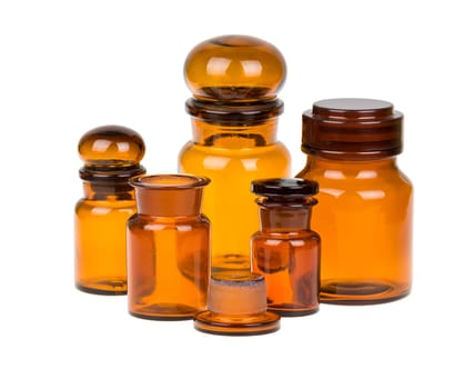 Set of vintage brown apothecary bottles isolated on white background