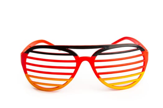 Funny eyeglasses in german national colors over white background