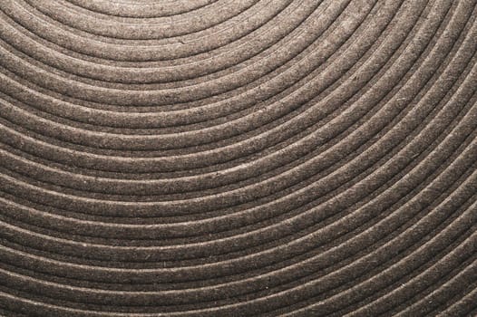 Geometric background with stripes. black texture with parallel curved lines