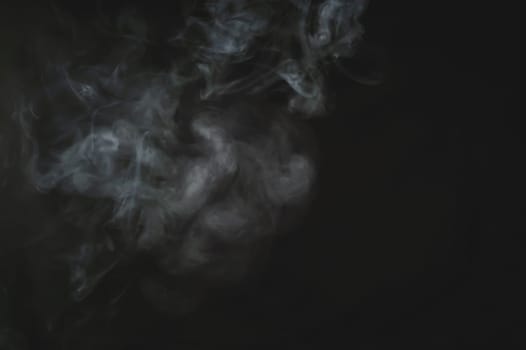 Smoke in the dark. abstract fog on the black background