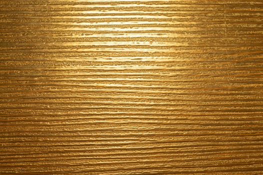 Uneven golden texture background. brown background
