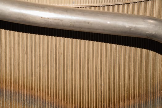 Old ribbed metal texture. corrugated steel background. metal pipe