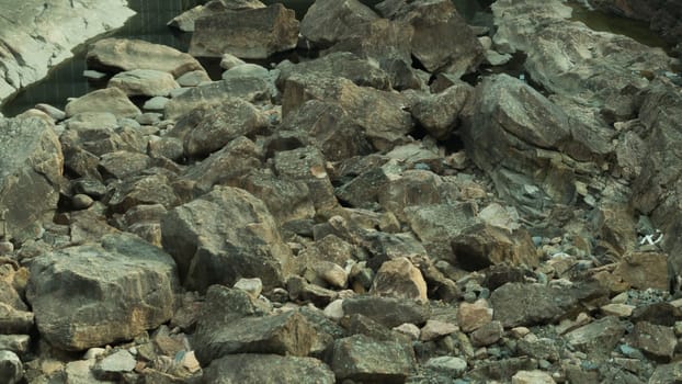 Rocky abstract background. stones in the dry course backdrop