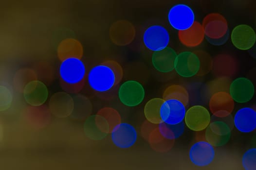 Abstract colorful bokeh defocused lights. holiday background