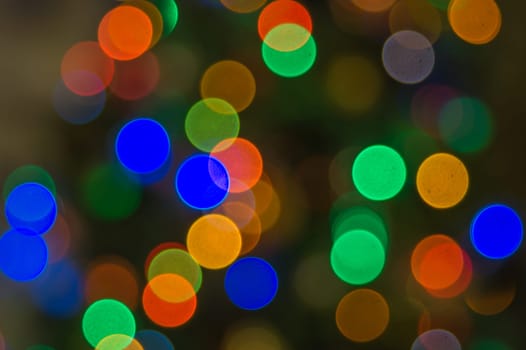 Abstract colorful bokeh defocused lights. holiday background