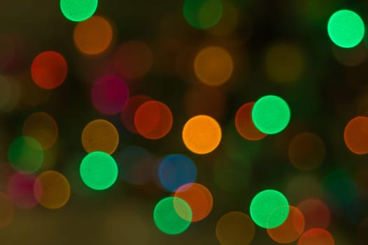 Abstract colorful bokeh defocused lights. holiday background