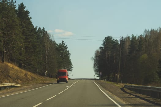 Car driving on a highway. auto moving on a roadway background