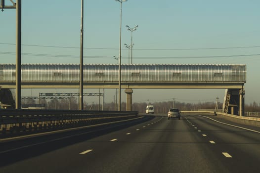 Car driving on a highway. auto moving on a roadway background