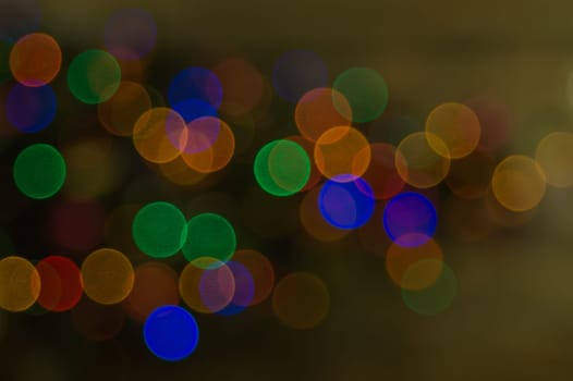 Abstract colorful bokeh defocused lights. holiday background